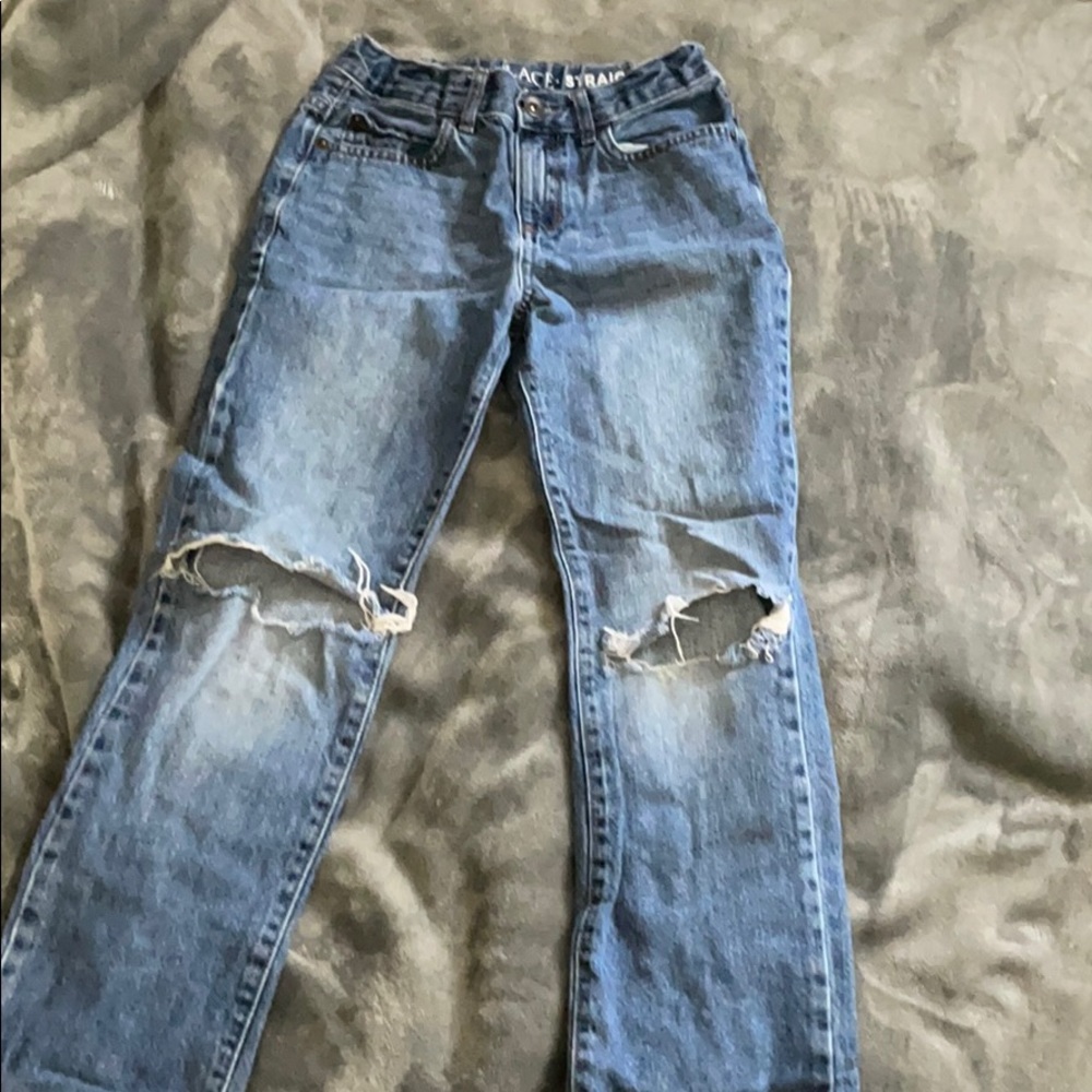 Children place rip jeans